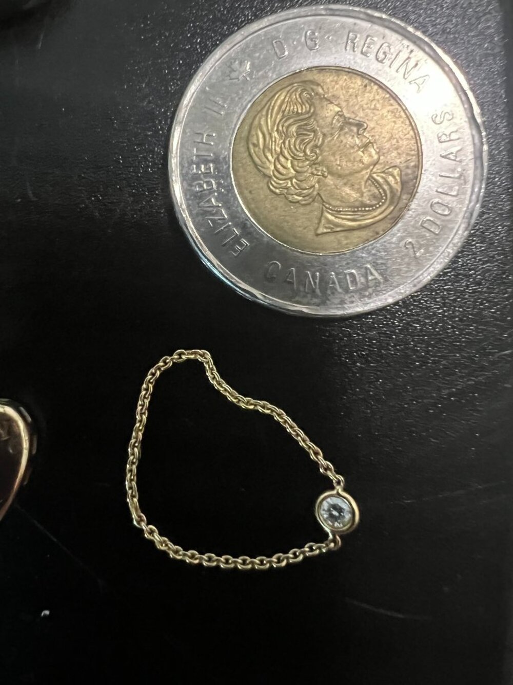 18K gold chain ring with a small diamond purchased from Paris Size 8